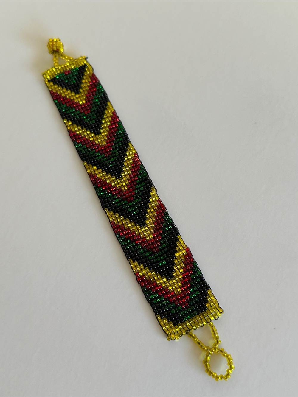 Handmade Glass Bead Chevron Bracelet in Yellow, Black, Green, Red
